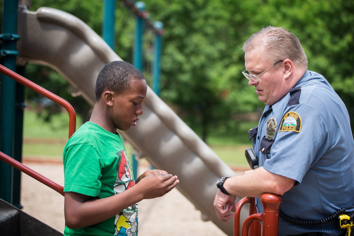 Police Officer Rob Zink with 12 year old autistic boy