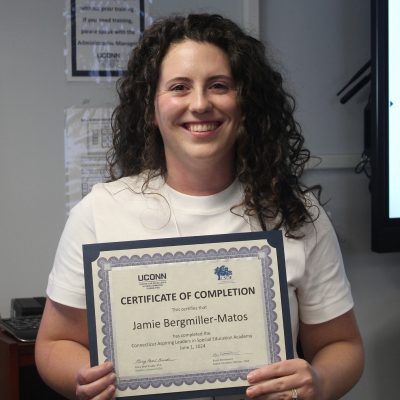 Photo of Jamie Bergmiller with her certificate