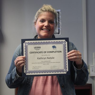 Photo of Kathryn Natale with her certificate