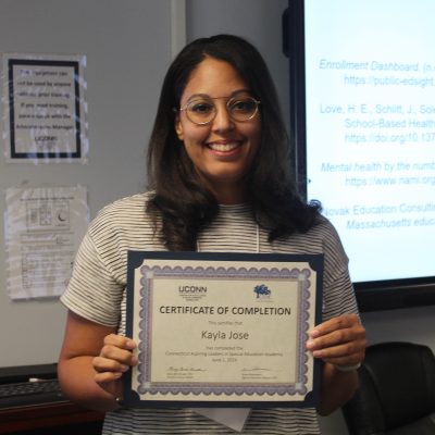 Photo of Kayla Jose with her certificate